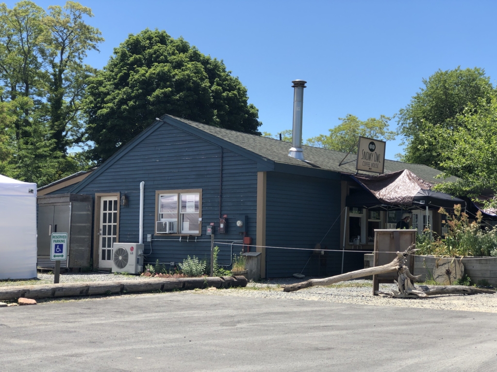 terior of Snowy Owl Coffee Roasters café in Brewster, Massachusetts